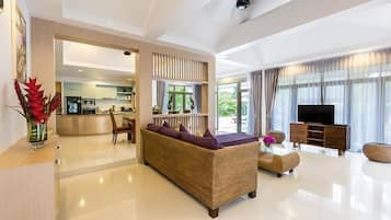 Family Villa | Living area | 32-inch flat-screen TV with satellite channels, LED TV