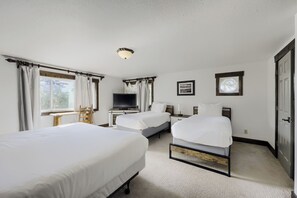 A hotel room with two beds, a desk with a television, and a window with curtains. - Free SkyCard Activi - Close To Town/Lifts, Private Hot Tub - High Point Chateau (Breckenridge)