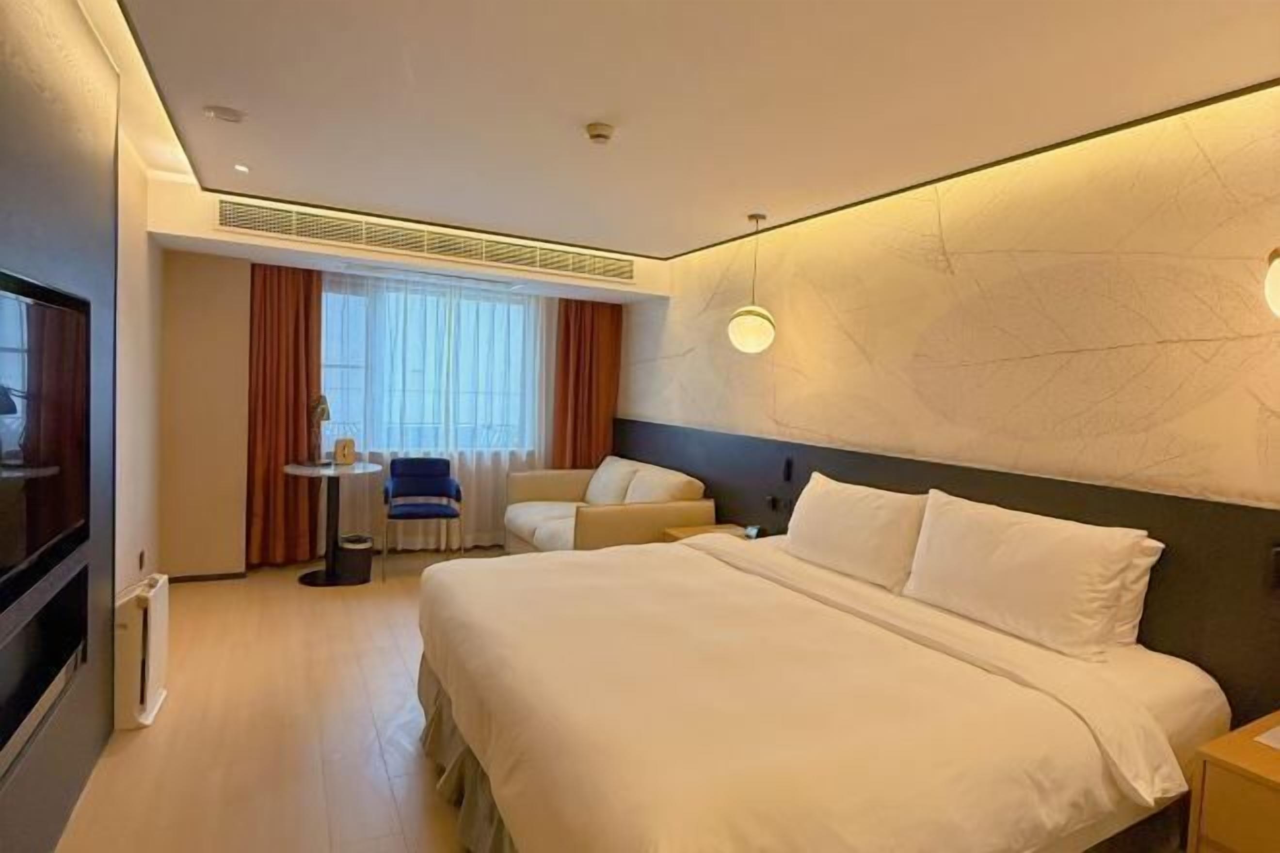 Premium bedding, down duvets, memory-foam beds, in-room safe