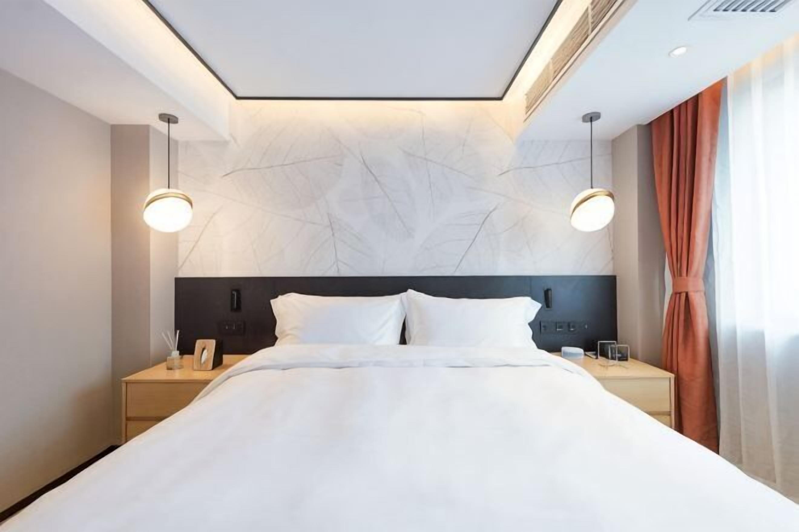 Premium bedding, down duvets, memory-foam beds, in-room safe