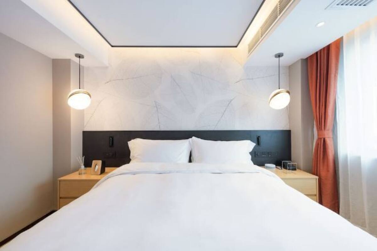 Premium bedding, down comforters, memory foam beds, in-room safe