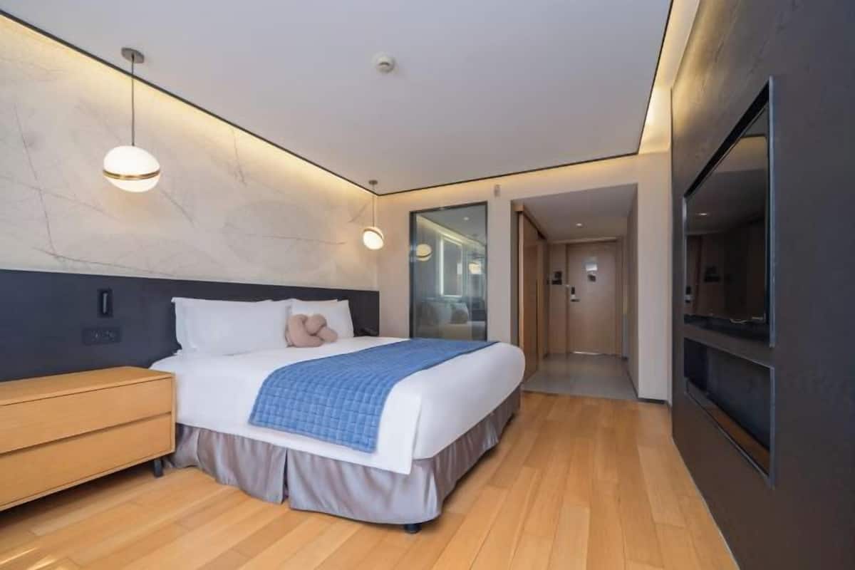 Premium bedding, down duvets, memory-foam beds, in-room safe