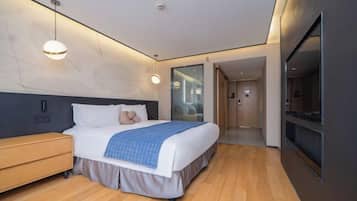 Premium bedding, down duvets, memory-foam beds, in-room safe