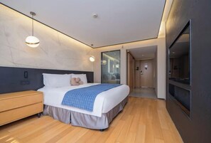 Premium bedding, down comforters, memory foam beds, in-room safe