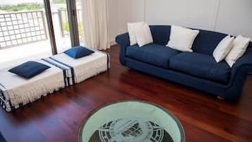 Deluxe House, Multiple Beds | Living room | TV, fireplace