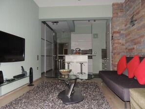 Plasma TV, DVD player, MP3 dock