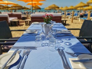 Breakfast, lunch served; local and international cuisine, beach views