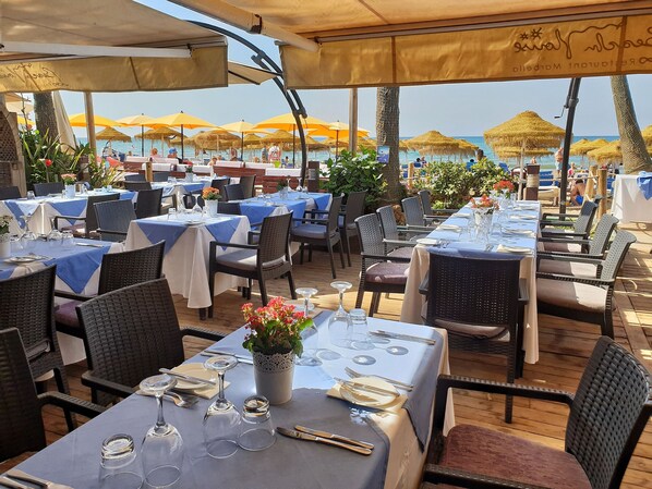 Breakfast, lunch served; local and international cuisine, beach views