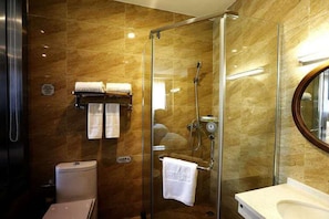 Shower, free toiletries, slippers