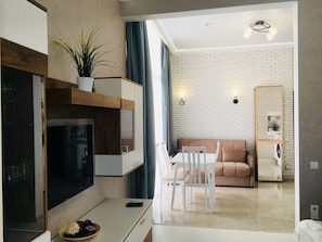 Apartment, Nichtraucher | Schreibtisch, Bügeleisen/Bügelbrett, kostenloses WLAN, Bettwäsche