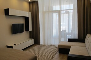 Apartment, Non Smoking | Desk, iron/ironing board, free WiFi, bed sheets - Apartment on Bulvar Nadezhd Apt.307 (Sirius)