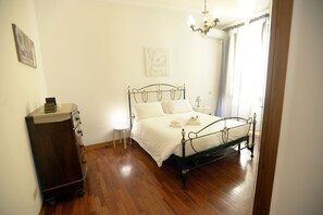 Apartment, 1 Bedroom | 1 bedroom, iron/ironing board, free cribs/infant beds, free WiFi - Mecenate Deluxe Colosseum (Rome)