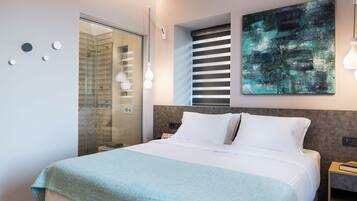 Junior suite, uitzicht op zee | Lakens van Egyptisch katoen, luxe beddengoed, pillowtop-bedden