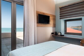 Suite SupĂ©rieure, balcon, en front de plage | Vue sur la plage/lâocĂ©an