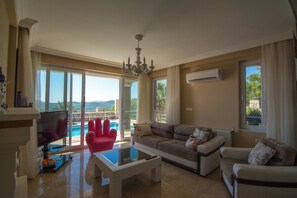 Villa | Living room | LED TV, fireplace