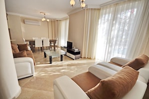 Villa, Pool View | Living room | LCD TV, fireplace, pay movies