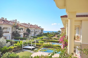 Outdoor pool, pool umbrellas, sun loungers