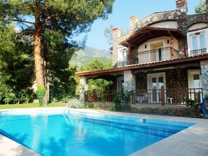 Outdoor pool, pool umbrellas, pool loungers