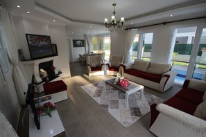 Villa, Pool View | Living room | LCD TV, fireplace, pay movies - Fenix 2 Solovilla (Fethiye)