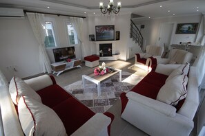 Villa, Pool View | Living room | LCD TV, fireplace, pay movies - Fenix 2 Solovilla (Fethiye)