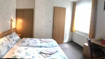 Desk, blackout curtains, free WiFi, bed sheets