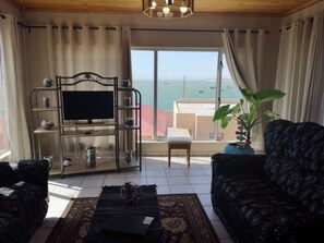 Family Apartment, 2 Bedrooms, Harbor View | Living area | LED TV, Netflix - Starfish Guesthouse (Luderitz)