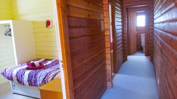 Basic Cabin, 3 Bedrooms | Premium bedding, individually decorated, individually furnished, desk