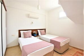 Appartement, 2 chambres, non-fumeurs | 2 chambres, bureau, fer et planche à repasser, draps fournis