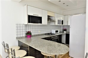 Apartment, 2 Bedrooms, Non Smoking | Private kitchen | Full-size fridge, oven, stovetop, dishwasher - Olympia Apartments 6 Solovilla (Fethiye)