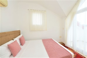 Appartement, 2 chambres, non-fumeur | 2 chambres, bureau, fer et planche à repasser, literie fournie