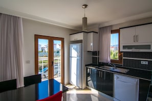 Apartment, Pool View | Private kitchenette | Full-sized fridge, microwave, oven, stovetop