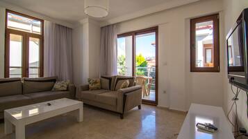 Apartment, Pool View | Living room | LCD TV, pay movies