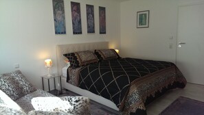 Superior Condo, 1 Bedroom | 2 bedrooms, individually furnished, desk, laptop workspace