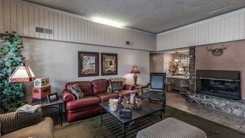 Condo, Multiple Beds, Patio, Golf View | Living room | TV, fireplace, DVD player