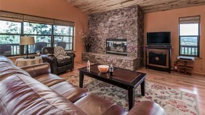 Cabin, Multiple Beds, Hot Tub, Mountain View | Living room | Flat-screen TV, fireplace, DVD player