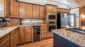 Cabin, Multiple Beds, Patio, Mountain View | Private kitchen | Coffee/tea maker, fridge, microwave, oven - Blue Bear Retreat - Eight Bedroom Cabin (Ruidoso)