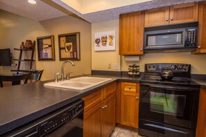 House, Multiple Beds, Fireplace | Private kitchen | Fridge, microwave, oven, stovetop - Hook, Wine & Sinker 2 Bedroom Townhome (McHenry)