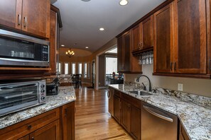 House, Multiple Beds, Hot Tub | Private kitchen | Fridge, microwave, oven, stovetop - Woodland Chalet 8 Bedroom House (Swanton)