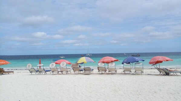 On the beach, white sand, fishing