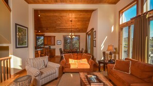 House, Multiple Beds, Hot Tub | Living room | TV, fireplace, DVD player - At the Heart of it All 4 Bedroom House (McHenry)
