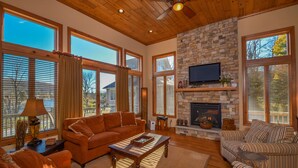 House, Multiple Beds, Hot Tub | Living room | TV, fireplace, DVD player - At the Heart of it All 4 Bedroom House (McHenry)
