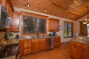 House, Multiple Beds, Hot Tub | Private kitchen | Fridge, microwave, oven, stovetop - At the Heart of it All 4 Bedroom House (McHenry)