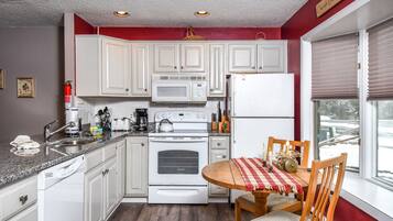 House, Multiple Beds, Fireplace | Private kitchen | Fridge, microwave, oven, stovetop