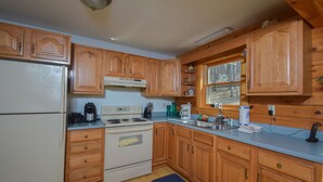 Maison, plusieurs lits, bain à remous | Cuisine privée