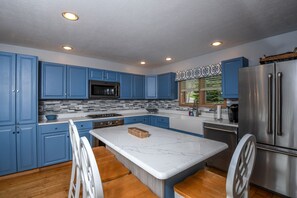 House, Multiple Beds, Hot Tub | Private kitchen | Fridge, microwave, oven, stovetop - At Lake's Edge 6 Bedroom House (McHenry)