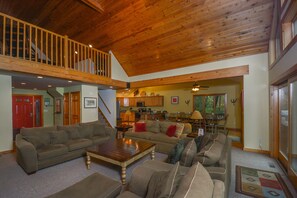 House, Multiple Beds, Hot Tub | Living room | TV, fireplace - All Decked Out 4 Bedroom House (McHenry)