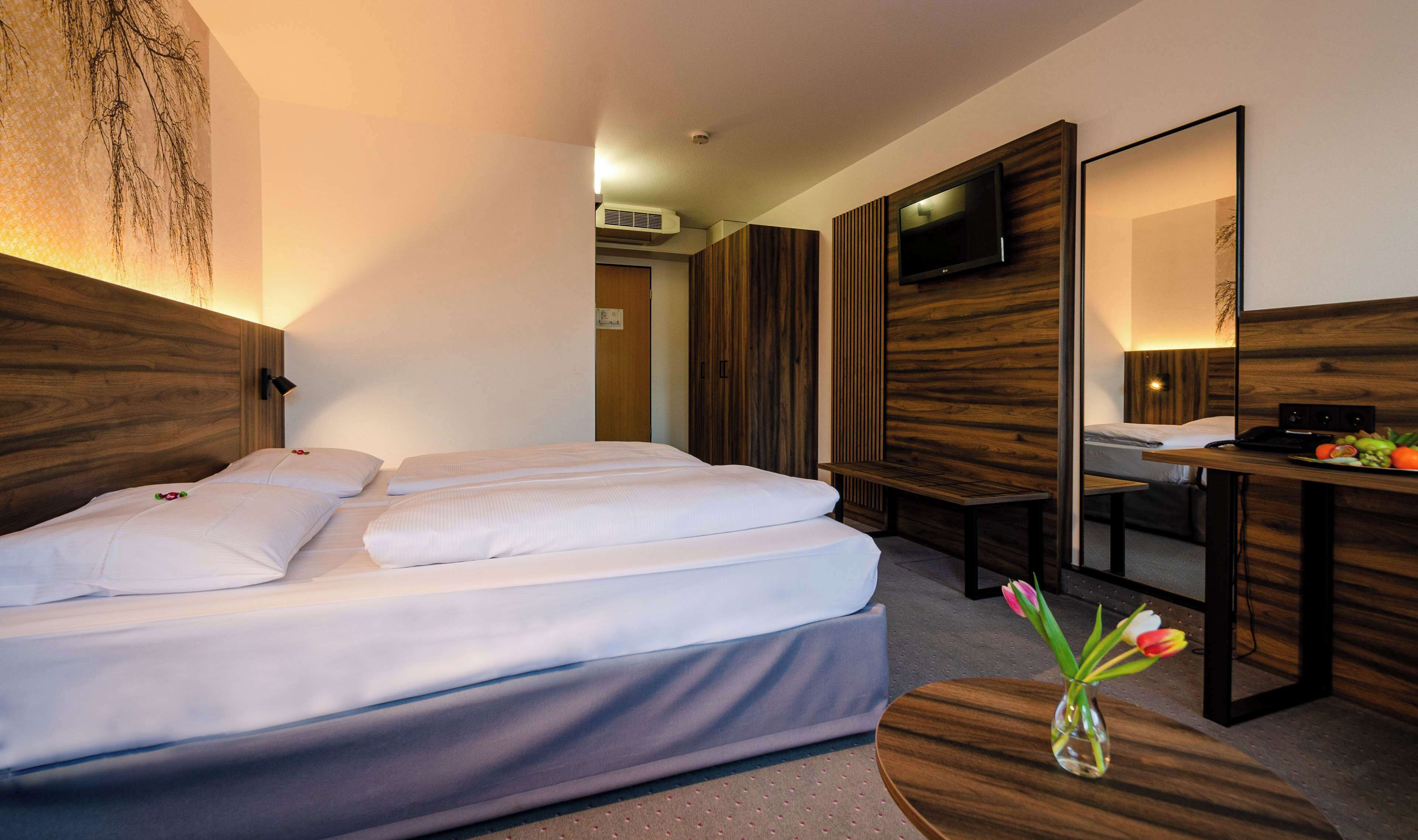 comfort room | in-room safe, desk, laptop workspace, iron/ironing board