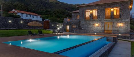 Outdoor pool, open noon to 7:00 PM, pool umbrellas, sun loungers