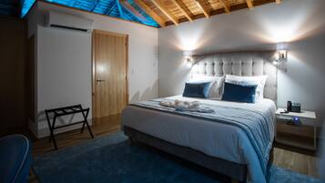 Premium bedding, down duvets, minibar, in-room safe