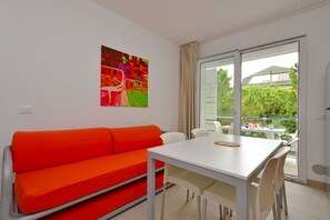 32-inch flat-screen TV with satellite channels, TV